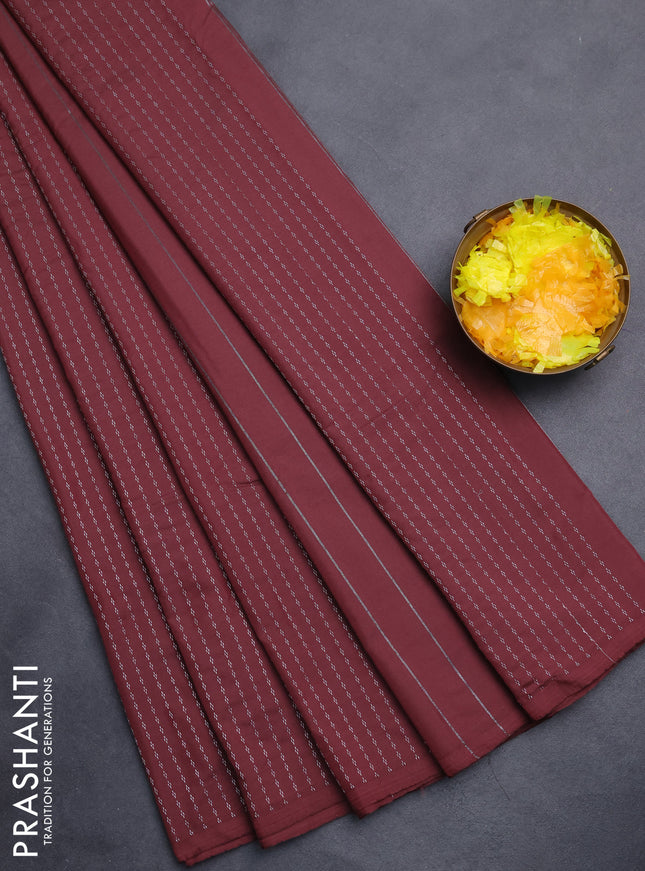 Arani semi silk saree deep maroon with allover silver zari weaves in borderless style