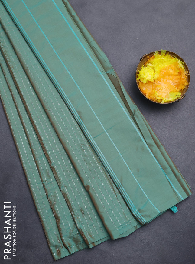 Arani semi silk saree dual shade of green with allover silver zari weaves in borderless style