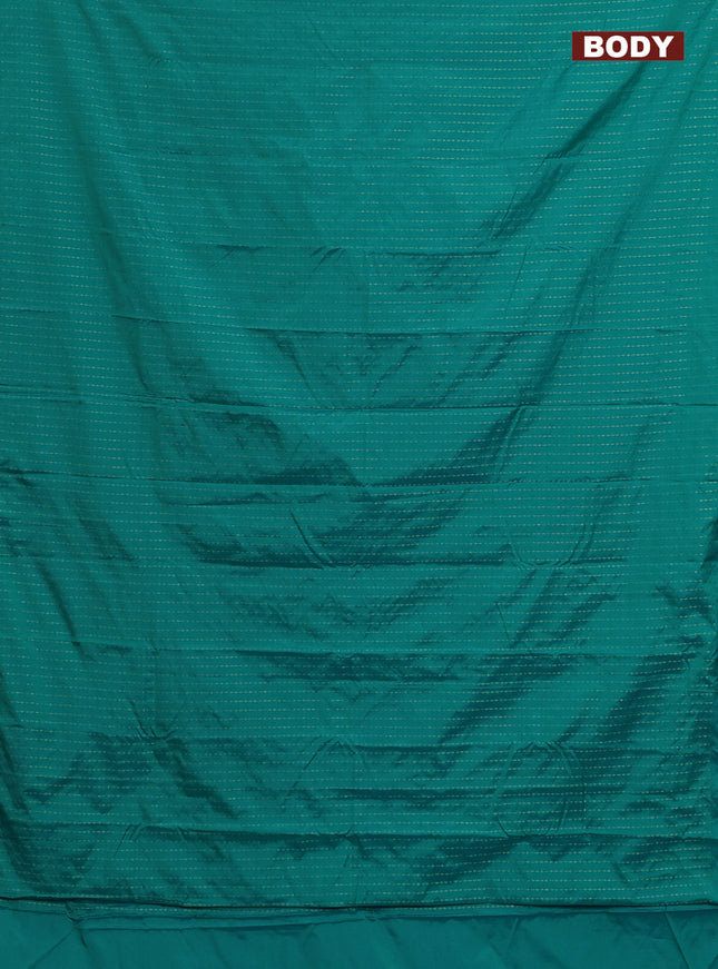 Arani semi silk saree teal blue shade with allover zari weaves in borderless style