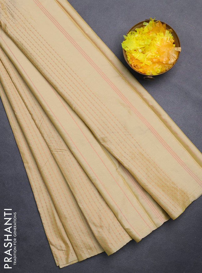 Arani semi silk saree pale yellow with allover copper zari weaves in borderless style
