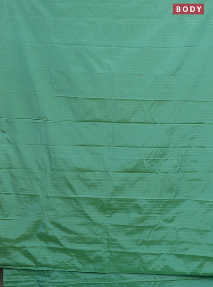 Arani semi silk saree teal green with allover zari weaves in borderless style