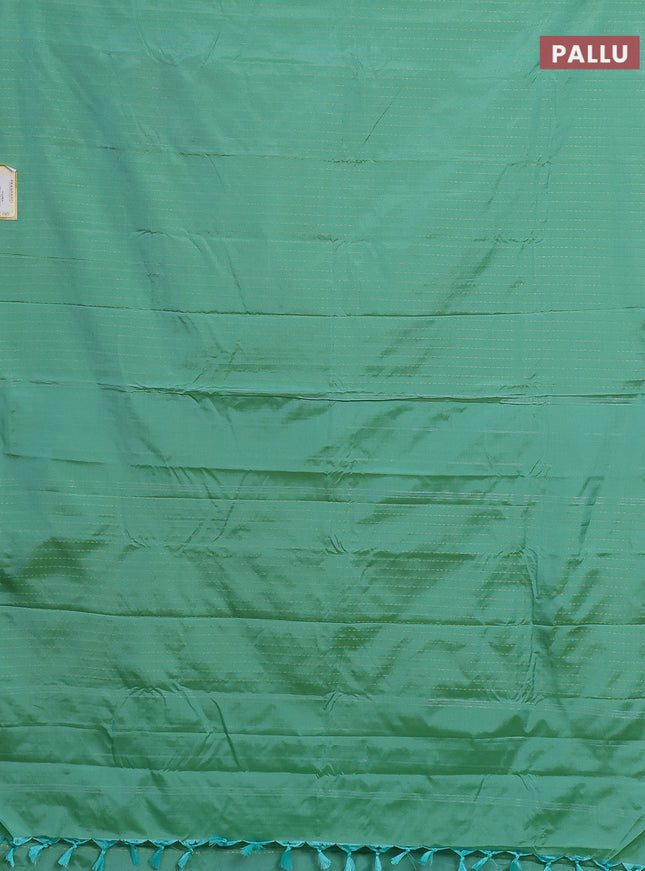 Arani semi silk saree teal green with allover zari weaves in borderless style
