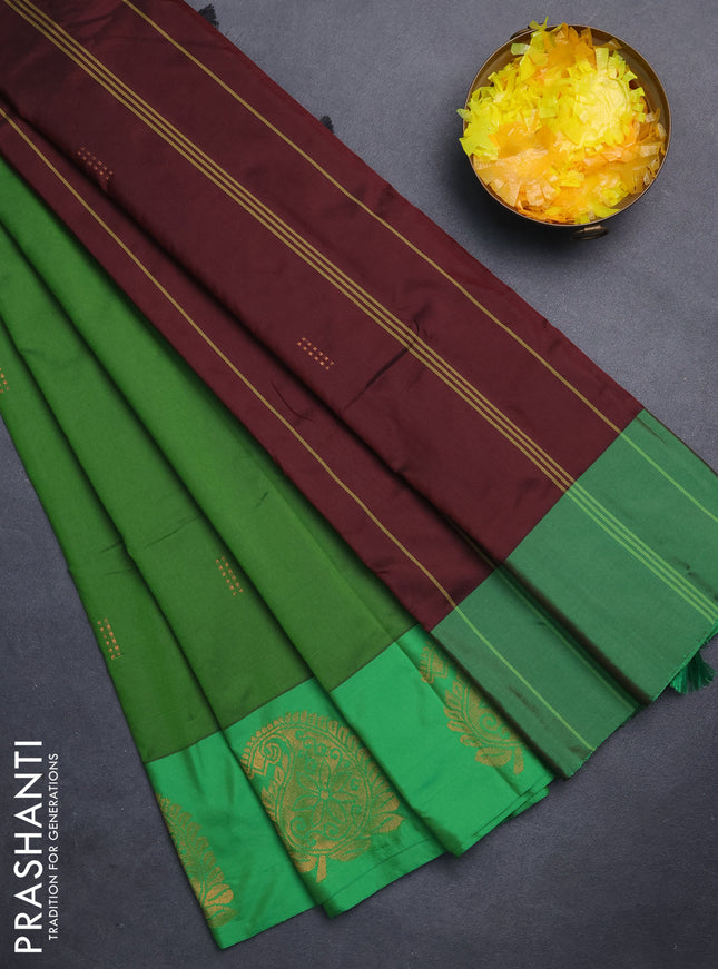 Arani semi silk saree green with zari woven buttas and paisley zari woven butta border