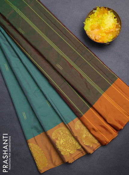 Arani semi silk saree teal green and mustard yellow with zari woven buttas and paisley zari woven butta border