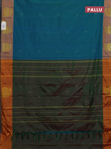 Arani semi silk saree teal blue shade and dual shade of mustard with zari woven buttas and paisley zari woven butta border