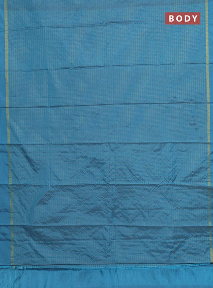 Arani semi silk saree blue shade with allover small zari checked pattern and zari woven simple border