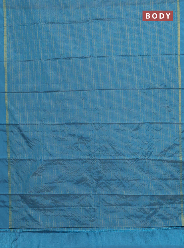 Arani semi silk saree blue shade with allover small zari checked pattern and zari woven simple border