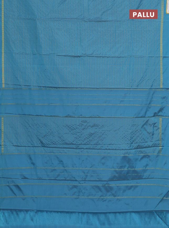 Arani semi silk saree blue shade with allover small zari checked pattern and zari woven simple border