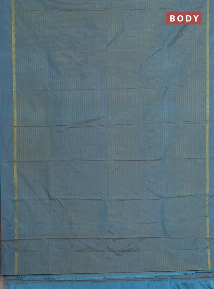 Arani semi silk saree teal blue shade with allover small zari checked pattern and zari woven simple border