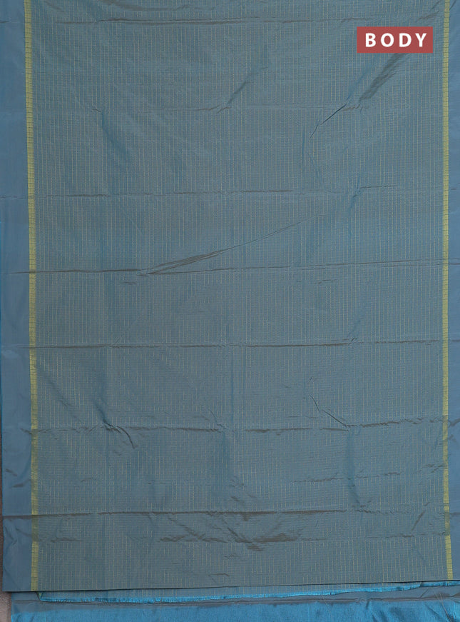 Arani semi silk saree teal blue shade with allover small zari checked pattern and zari woven simple border