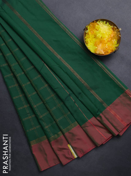 Arani semi silk saree green and dual shade of pink with allover copper zari checked pattern and copper zari woven simple border