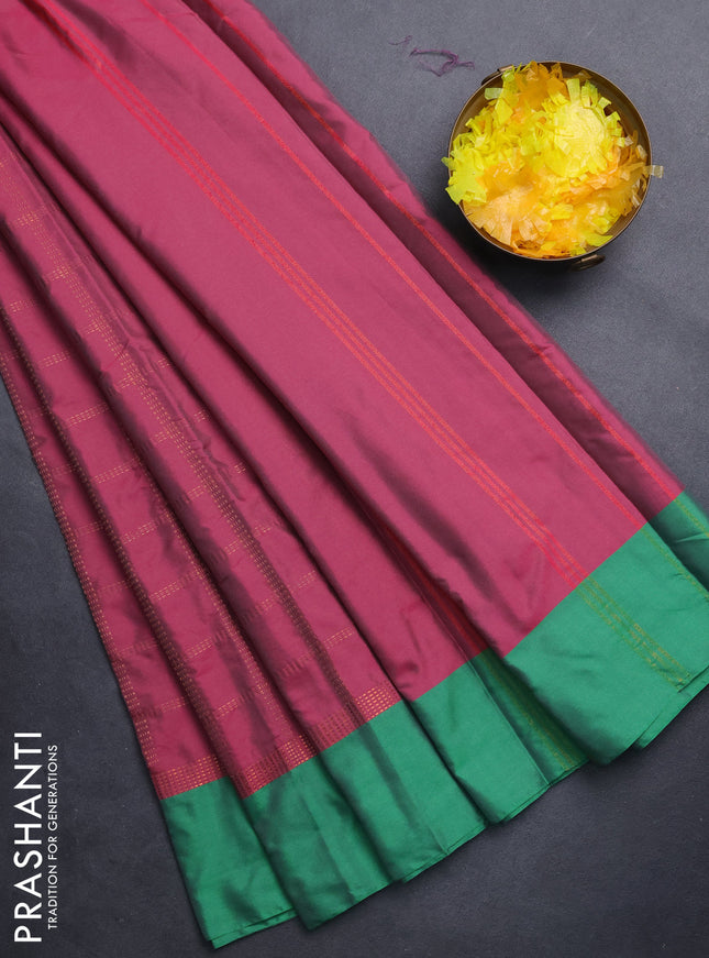Arani semi silk saree pink and green with allover copper zari checked pattern and copper zari woven simple border