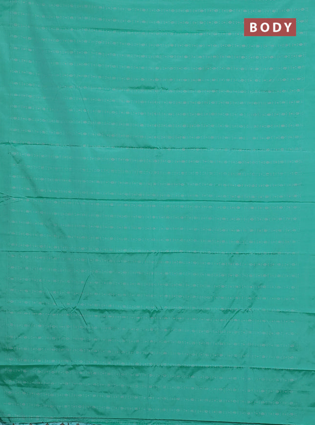 Arani semi silk saree teal green with allover silver zari weaves in borderless style