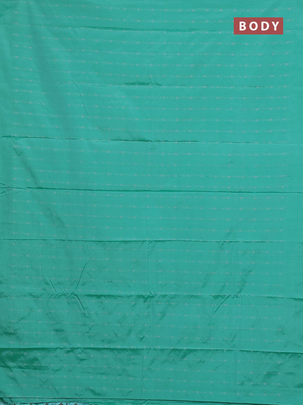 Arani semi silk saree teal green with allover silver zari weaves in borderless style