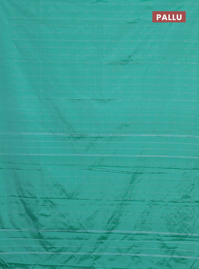 Arani semi silk saree teal green with allover silver zari weaves in borderless style