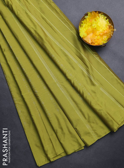 Arani semi silk saree lime green with allover silver zari weaves in borderless style