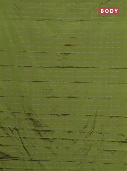 Arani semi silk saree light green with allover silver zari weaves in borderless style