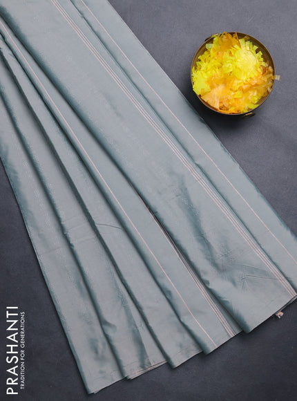 Arani semi silk saree dual shade of greyish green with allover silver zari weaves in borderless style