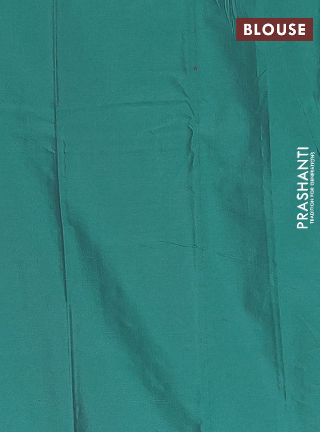 Arani semi silk saree teal green with allover silver zari weaves in borderless style