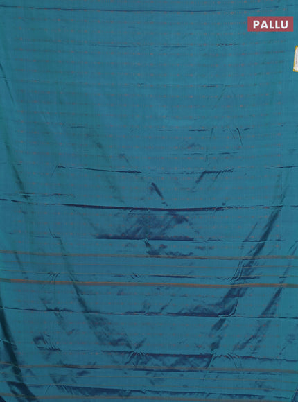 Arani semi silk saree dual shade of teal green with allover copper zari weaves in borderless style