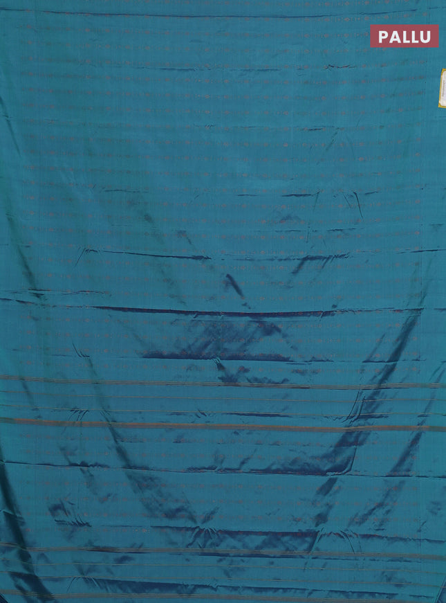 Arani semi silk saree dual shade of teal green with allover copper zari weaves in borderless style