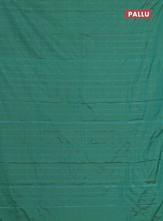 Arani semi silk saree teal green with allover silver zari weaves in borderless style
