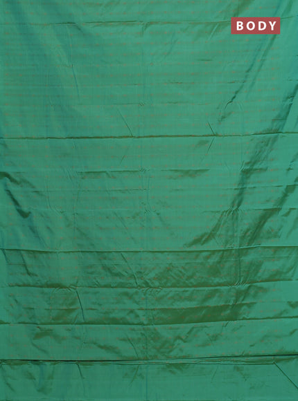 Arani semi silk saree green with allover copper zari weaves in borderless style