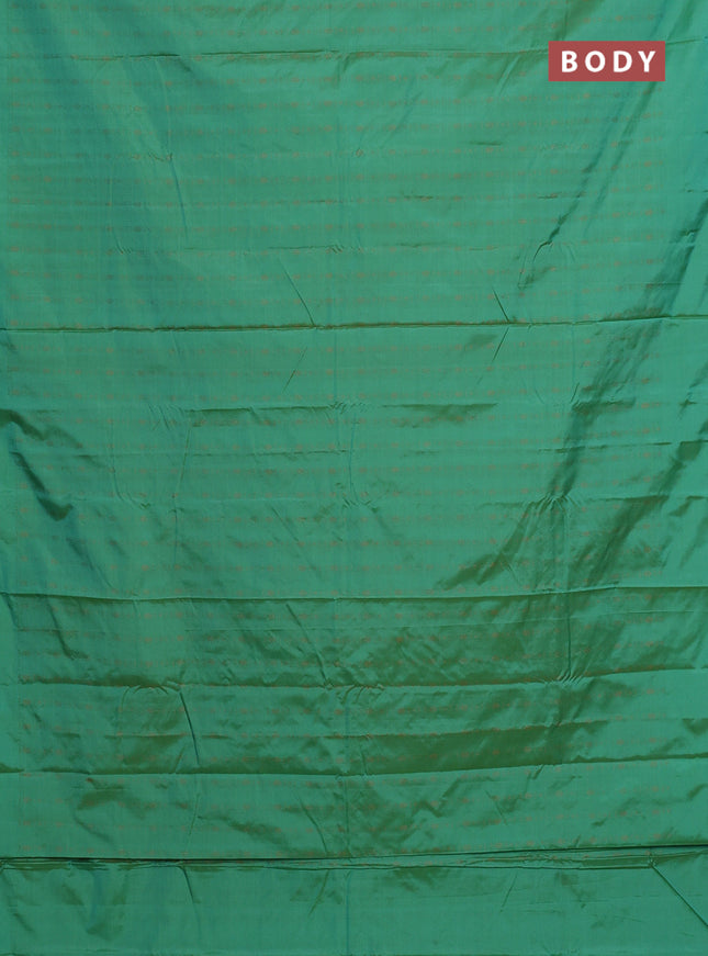 Arani semi silk saree green with allover copper zari weaves in borderless style