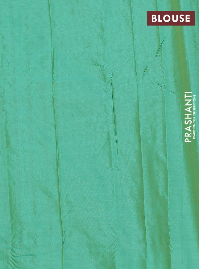Arani semi silk saree green with allover copper zari weaves in borderless style