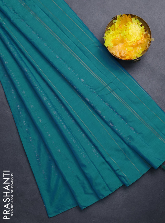 Arani semi silk saree teal blue with allover copper zari weaves in borderless style
