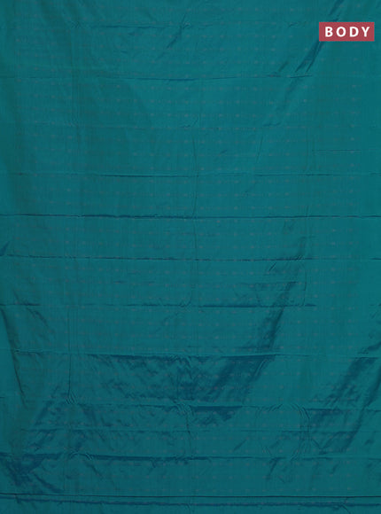 Arani semi silk saree teal blue with allover copper zari weaves in borderless style