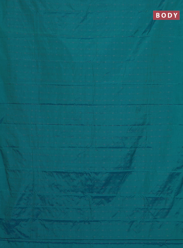 Arani semi silk saree teal blue with allover copper zari weaves in borderless style