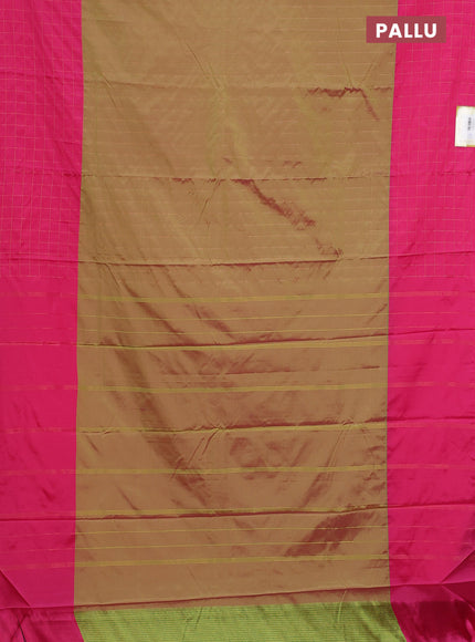 Arani semi silk saree dual shade of sap green and pink with allover copper zari weaves and zari checked border