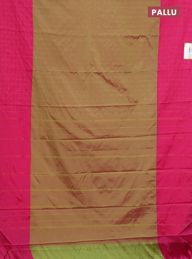 Arani semi silk saree dual shade of sap green and pink with allover copper zari weaves and zari checked border
