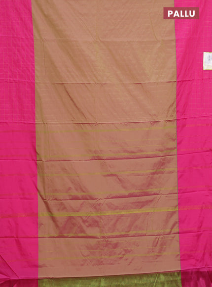 Arani semi silk saree dual shade of green and pink with allover copper zari weaves and zari checked border