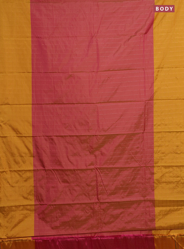 Arani semi silk saree dual shade of pink and dark mustard with allover copper zari weaves and zari checked border