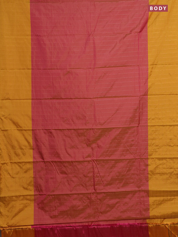 Arani semi silk saree dual shade of pink and dark mustard with allover copper zari weaves and zari checked border