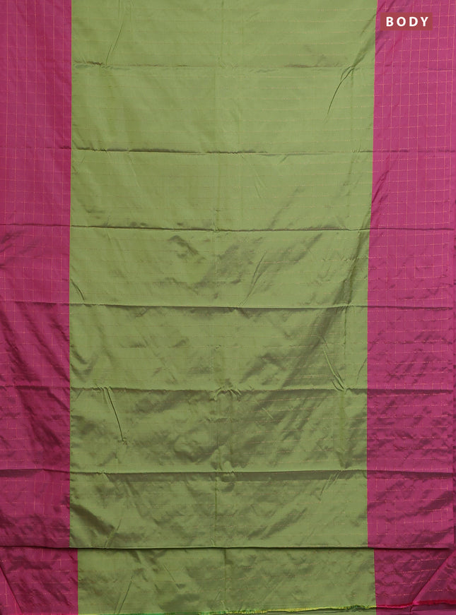 Arani semi silk saree green and magenta pink with allover copper zari weaves and zari checked border