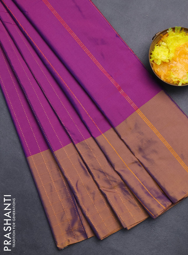 Arani semi silk saree purple and rust shade with allover copper zari weaves and zari checked border
