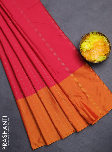 Arani semi silk saree pink and dark mustard with allover copper zari weaves and zari checked border