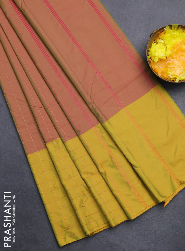 Arani semi silk saree dual shade of pinkish green and lime yellow with allover copper zari weaves and zari checked border