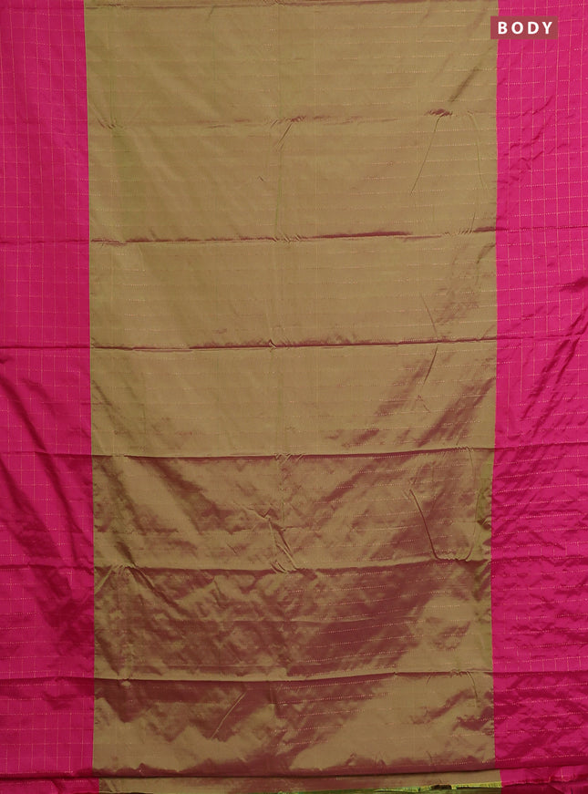 Arani semi silk saree dual shade of green and pink with allover copper zari weaves and zari checked border