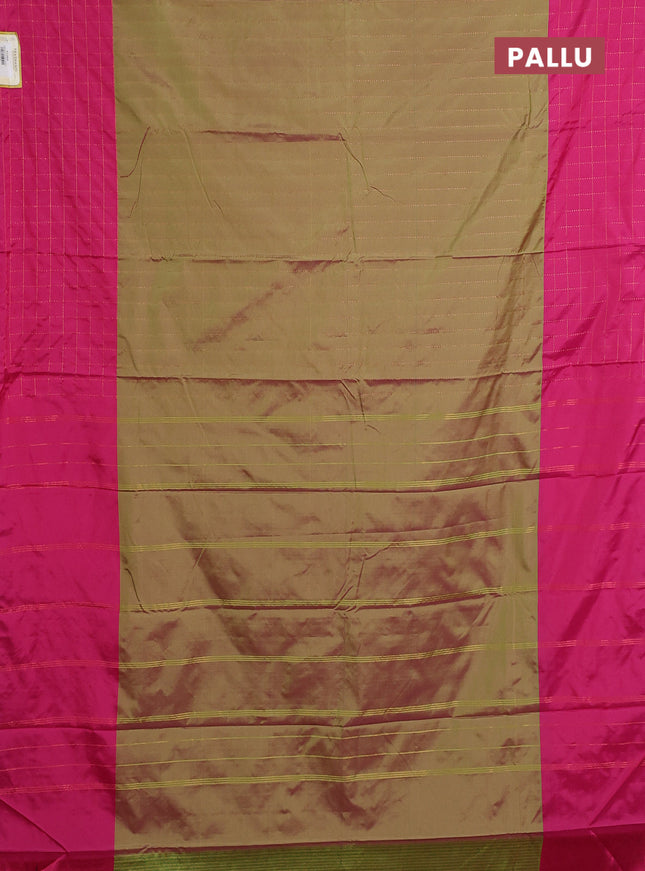 Arani semi silk saree dual shade of green and pink with allover copper zari weaves and zari checked border