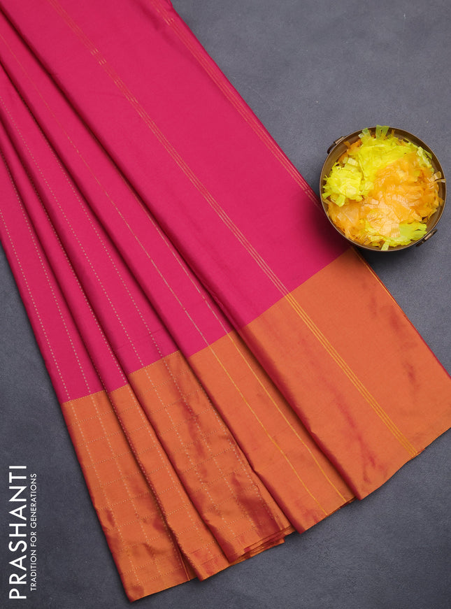 Arani semi silk saree pink and dark mustard with allover copper zari weaves and zari checked border