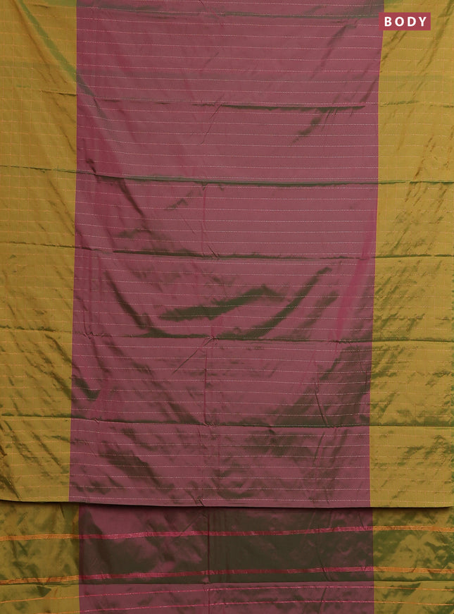 Arani semi silk saree dual shade of magenta pink and mustard green with allover copper zari weaves and zari checked border