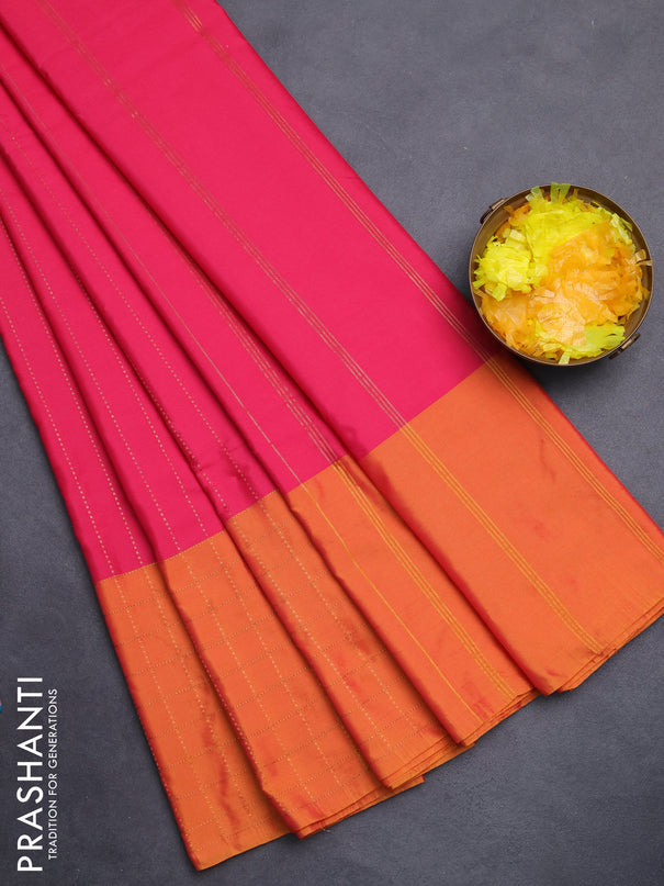 Arani semi silk saree pink and dark mustard with allover copper zari weaves and zari checked border