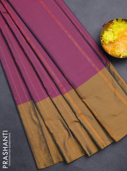 Arani semi silk saree dark purple and dark mustard with allover copper zari weaves and zari checked border