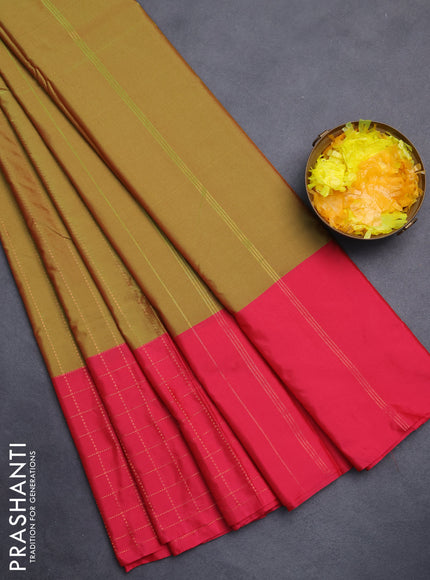 Arani semi silk saree dual shade of green and pink with allover copper zari weaves and zari checked border