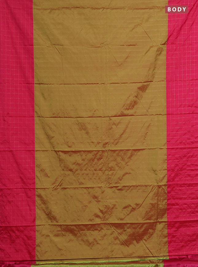 Arani semi silk saree dual shade of green and pink with allover copper zari weaves and zari checked border