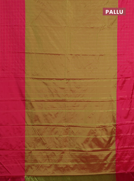 Arani semi silk saree dual shade of green and pink with allover copper zari weaves and zari checked border